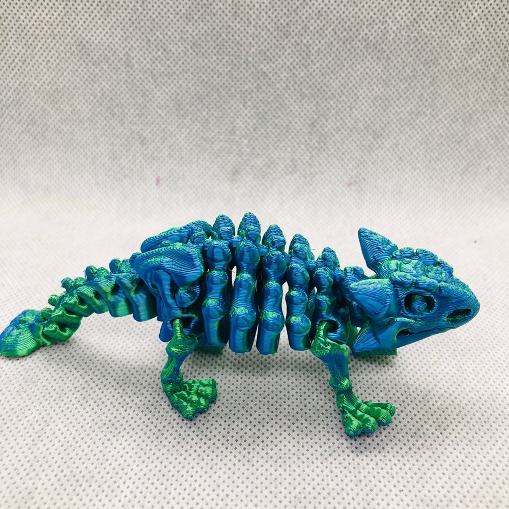 3D print toys
Blue & Green Reptile Skeleton Figurine - Decorative